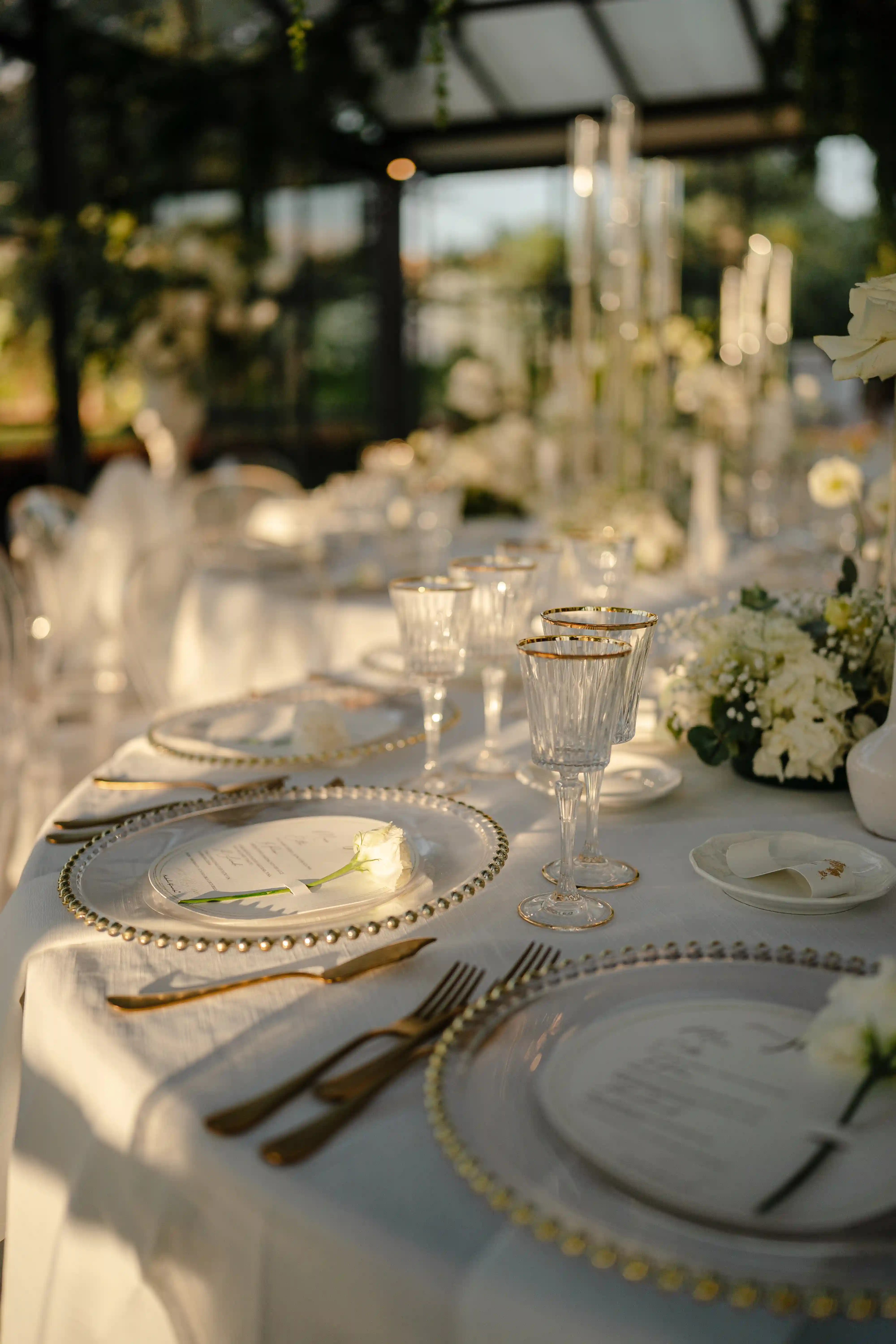 Elegant wedding table setting with golden hour light at Tenuta Calamuletti intimate reception